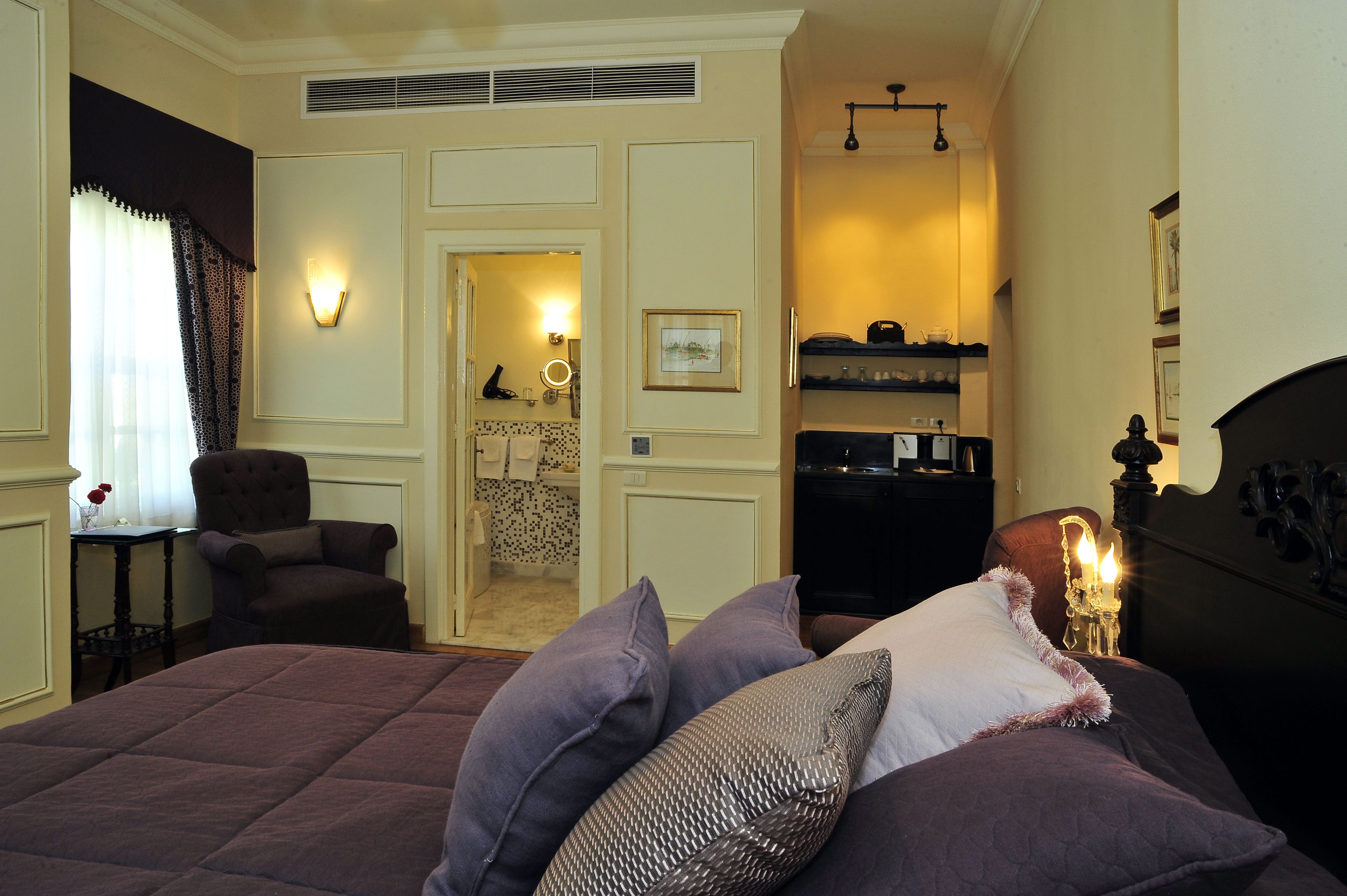 junior suite, garden view, garden area | 1 bedroom, premium bedding, free minibar items, in-room safe