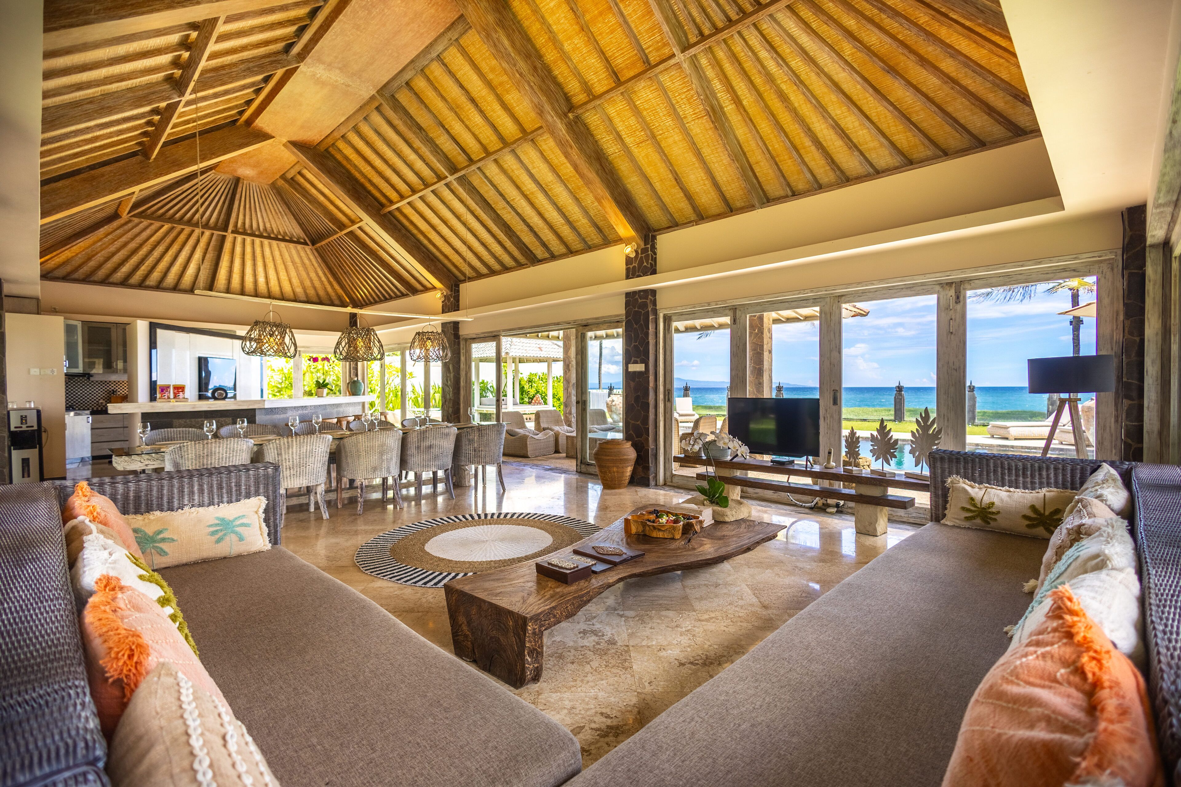 Four Bedroom Beach Front Pool Villa - Sunrise | Living area | 42-inch LCD TV with cable channels