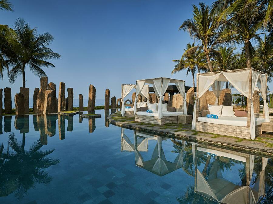 Outdoor pool, open 7:00 AM to 7:00 PM, free pool cabanas, pool umbrellas