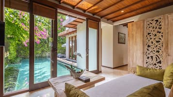 One Bedroom Pool Villa - Jepun | Living area | 42-inch LCD TV with cable channels