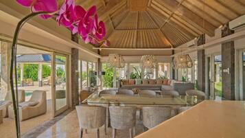 Four Bedroom Beach Front Pool Villa - Sunrise | Living area | 42-inch LCD TV with cable channels