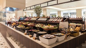 A buffet with various food items and a sign indicating compound salads. - Kerkyra Blue Hotel & Spa by Louis Hotels (Corfu)