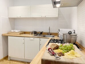 Deluxe Apartment, Kitchen | Private kitchen
