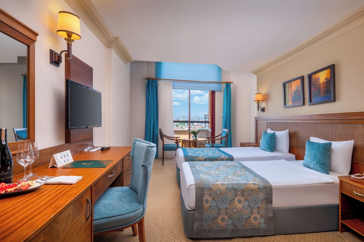 Family Room | Premium bedding, free minibar, in-room safe, desk