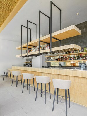 12 bars/lounges, poolside bar, beach bar