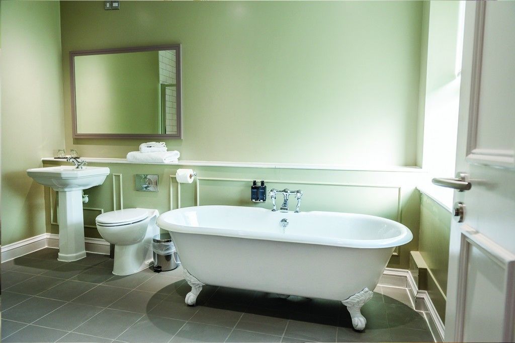 suite | bathroom | shower, designer toiletries, hair dryer, slippers