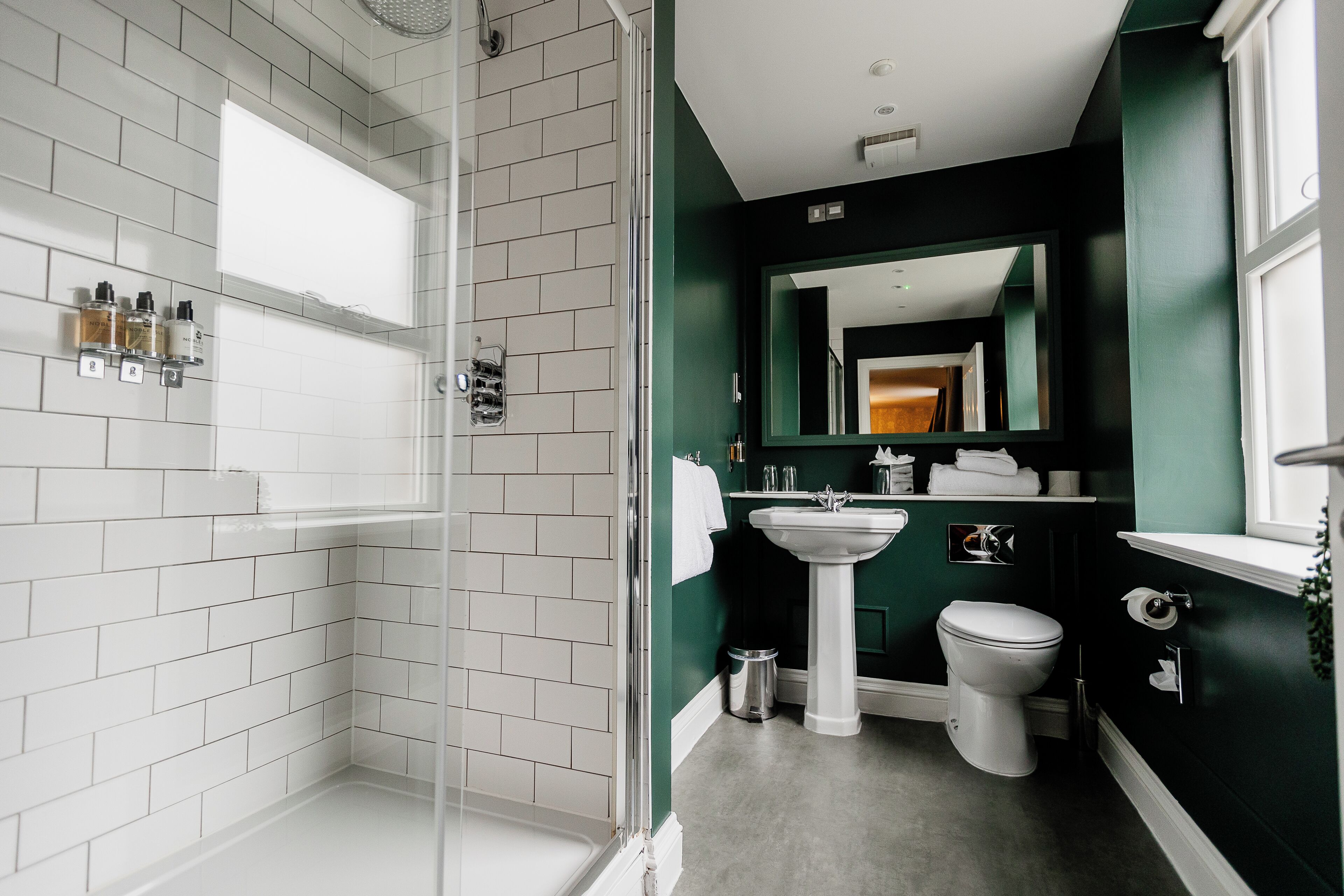 suite | bathroom | shower, designer toiletries, hair dryer, slippers