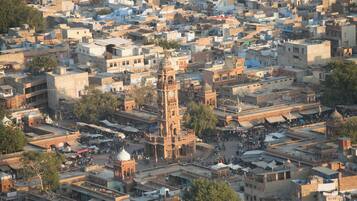 A densely packed urban area with historic architecture, including a prominent clock tower.