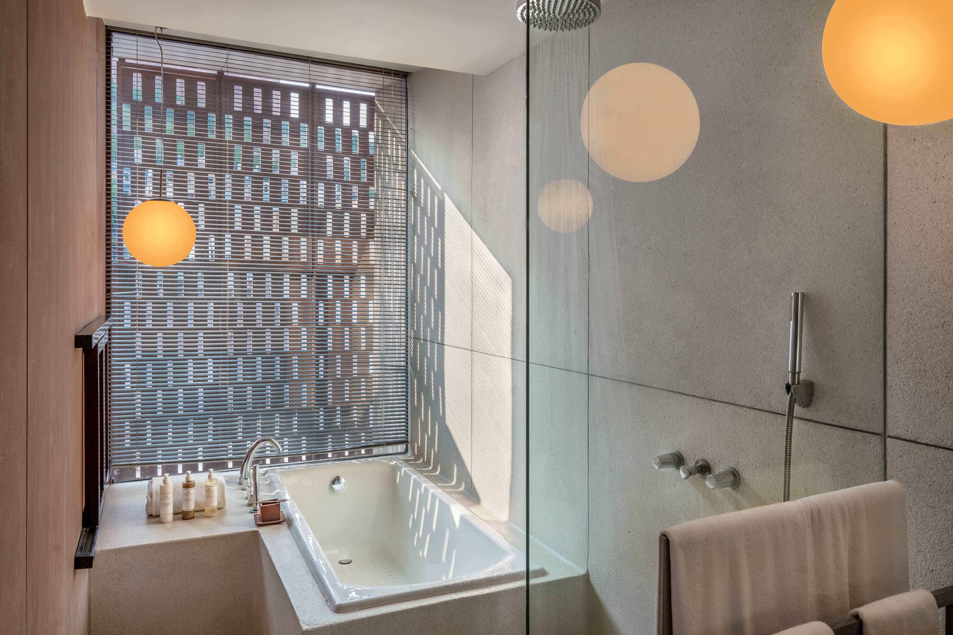 luxury room | bathroom | free toiletries, hair dryer, bathrobes, slippers