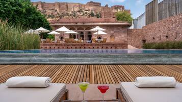 Outdoor pool, pool umbrellas, pool loungers