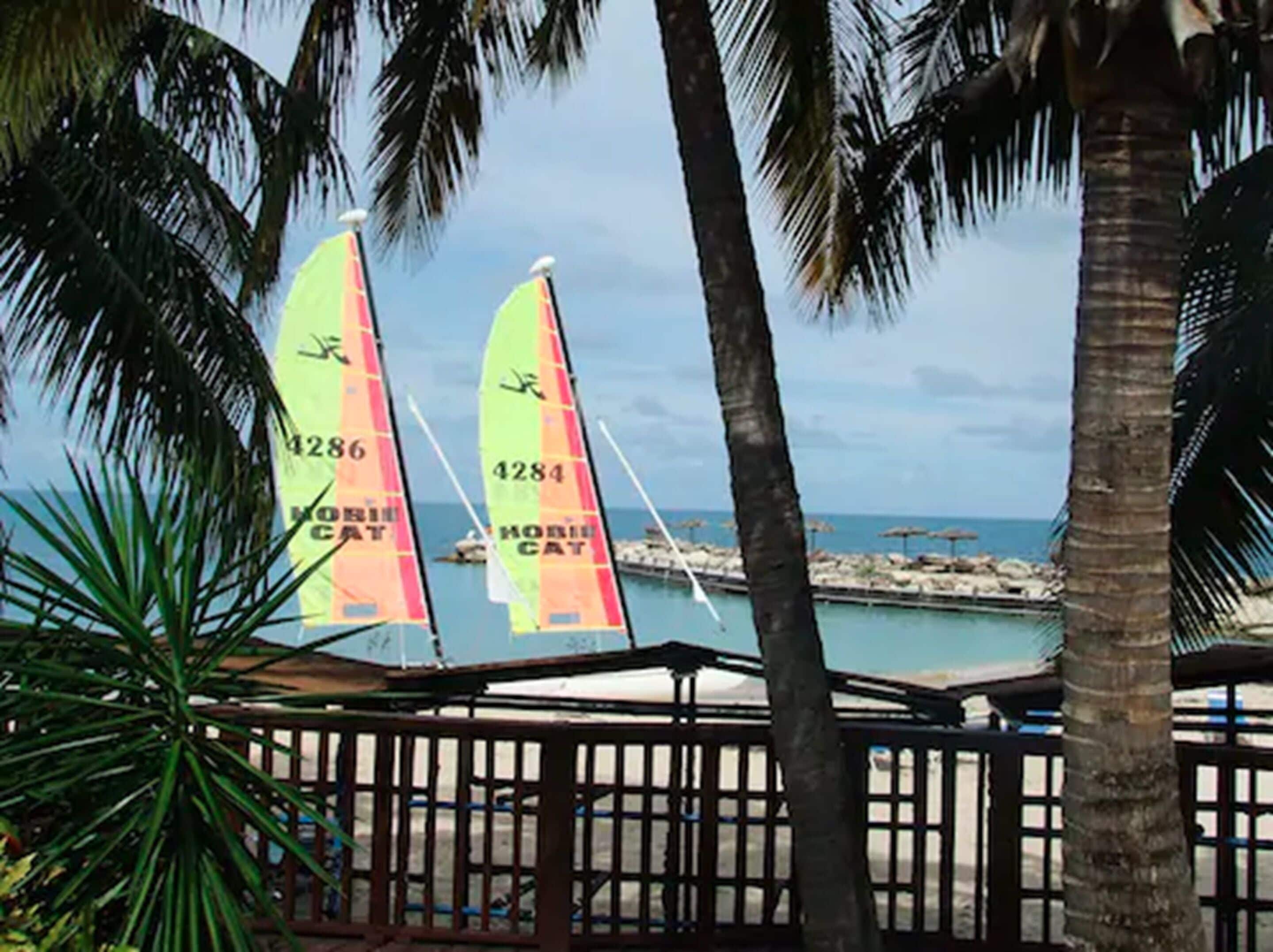 private beach, sun-loungers, beach umbrellas, beach towels