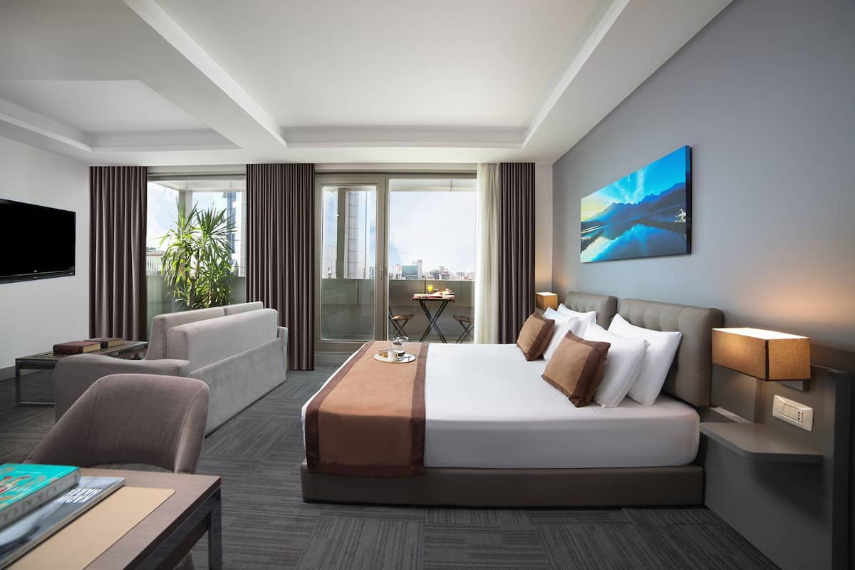 Executive suite, 1 slaapkamer | 1 slaapkamer, een gratis minibar, een kluis op de kamer
