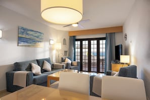 30-inch flat-screen TV with satellite channels, TV