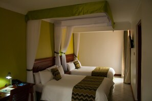 Luxe beddengoed, een kluis op de kamer, een bureau