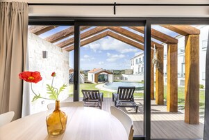 Villa | Living area | 20-cm flat-screen TV with cable channels, TV