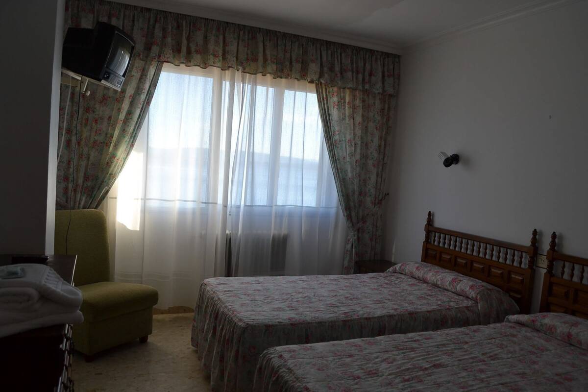 Double or Twin Room, Sea View | Desk, blackout curtains