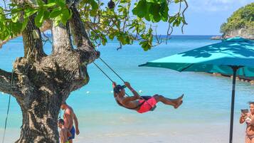 Private beach, beach cabanas, beach umbrellas, beach towels