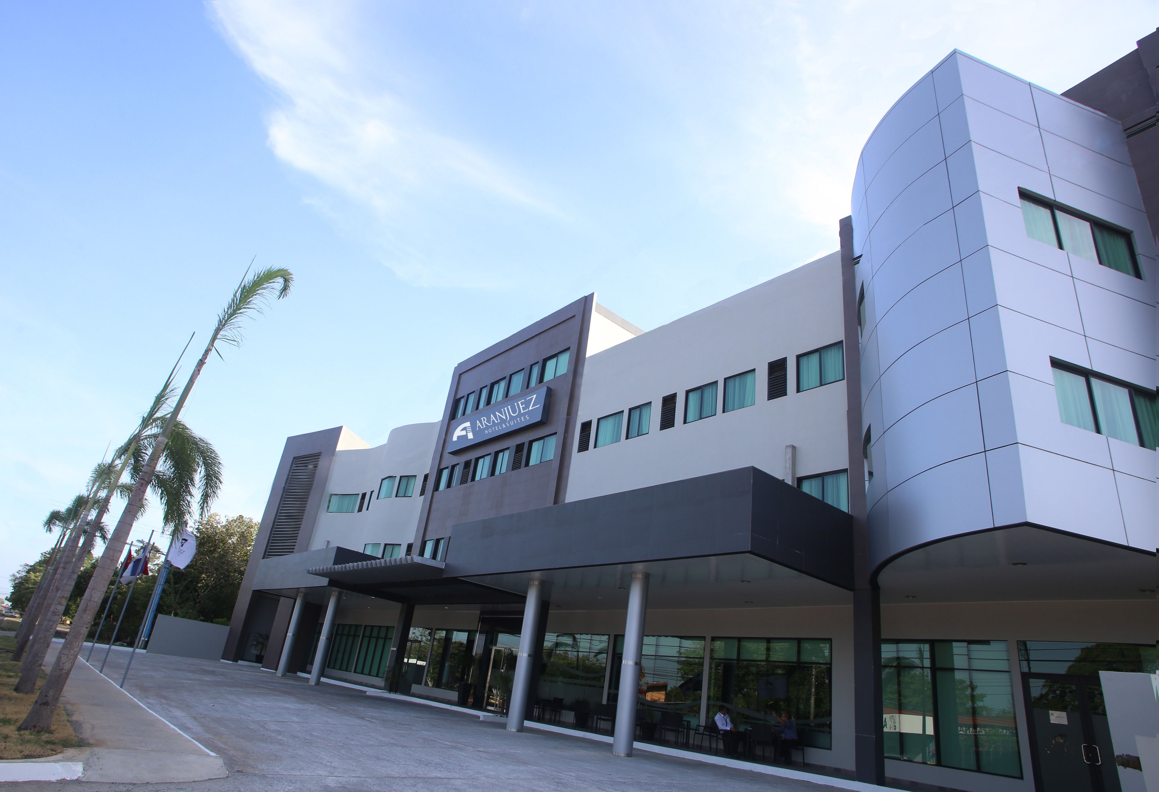 A modern building with a sign reading "ARANUEZ".