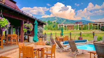 Outdoor pool, a heated pool, pool umbrellas, sun loungers