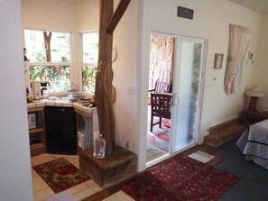 Family Double Room, Multiple Beds, Garden View | Private kitchenette | Coffee/tea maker, cookware/dishes/utensils, dining tables - Aloha Crater Lodge and Lava Tube (Volcano)
