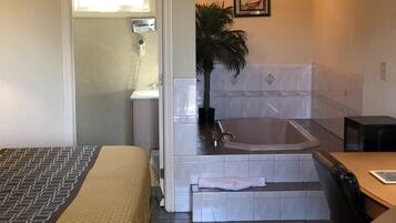 Standard Room, 1 King Bed, Smoking, Jetted Tub | Pillow-top beds, desk, blackout curtains, iron/ironing board