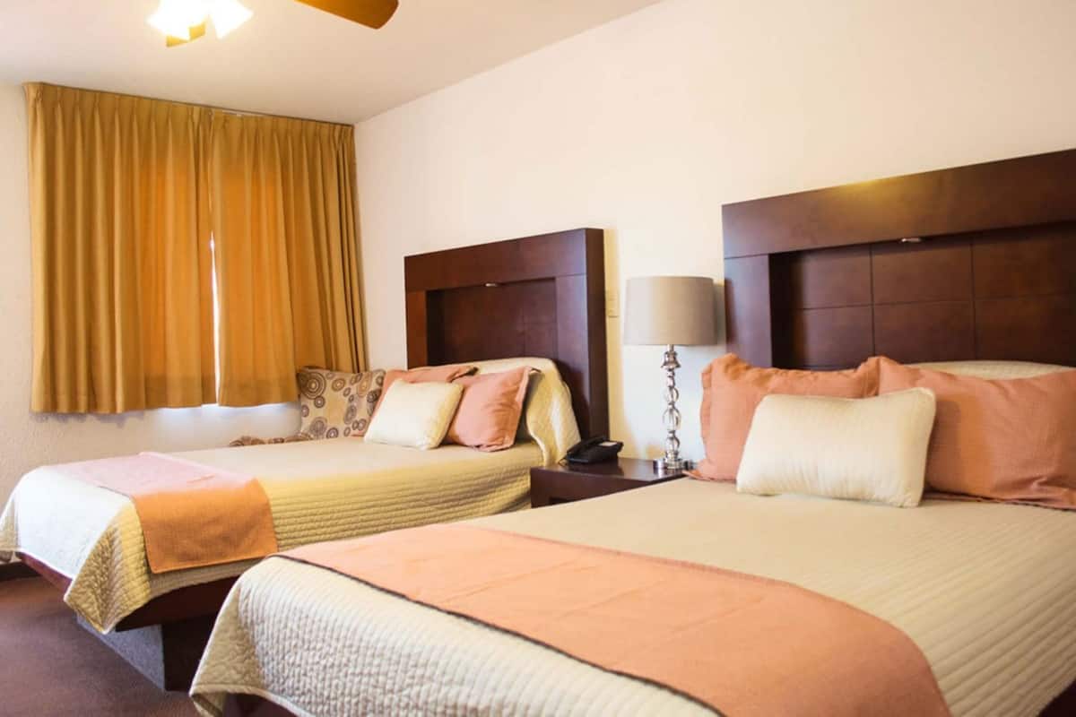 1 habitación, insonorización, wifi gratis y ropa de cama