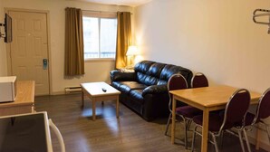 Family Suite, 2 Bedrooms | Desk, iron/ironing board, WiFi (free), bed sheets - Radium Park Lodge (Radium Hot Springs)