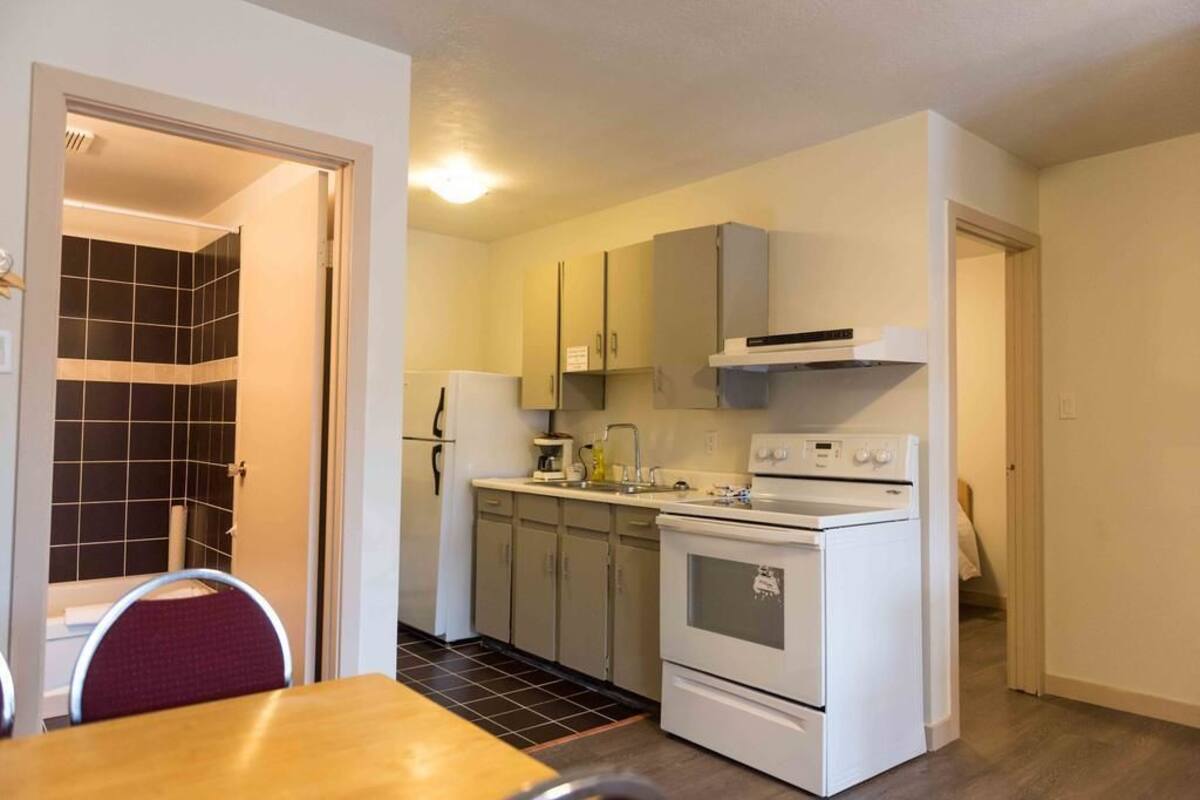 Family Suite, 2 Bedrooms | Desk, iron/ironing board, WiFi (free), bed sheets