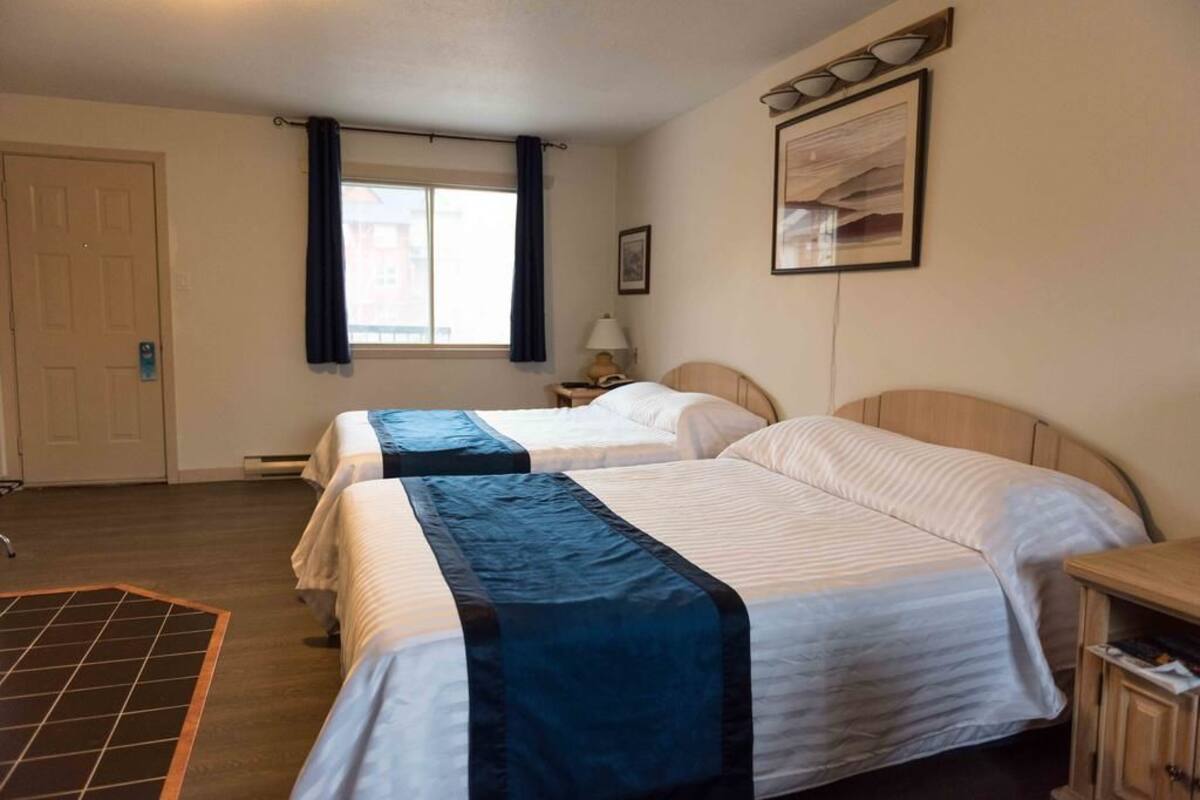 Standard Room, 2 Queen Beds | Desk, iron/ironing board, WiFi (free), bed sheets