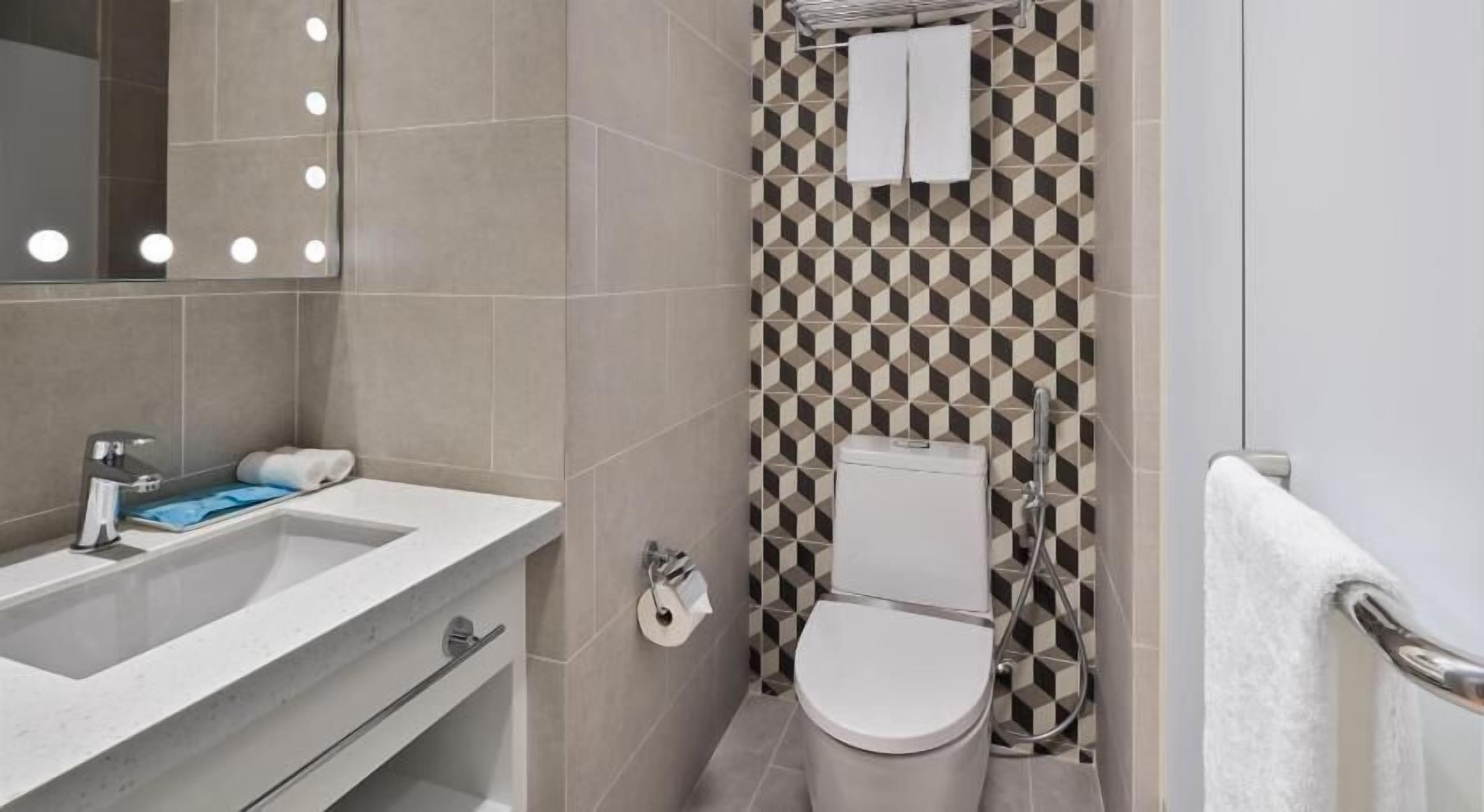 Shower, free toiletries, hair dryer, slippers