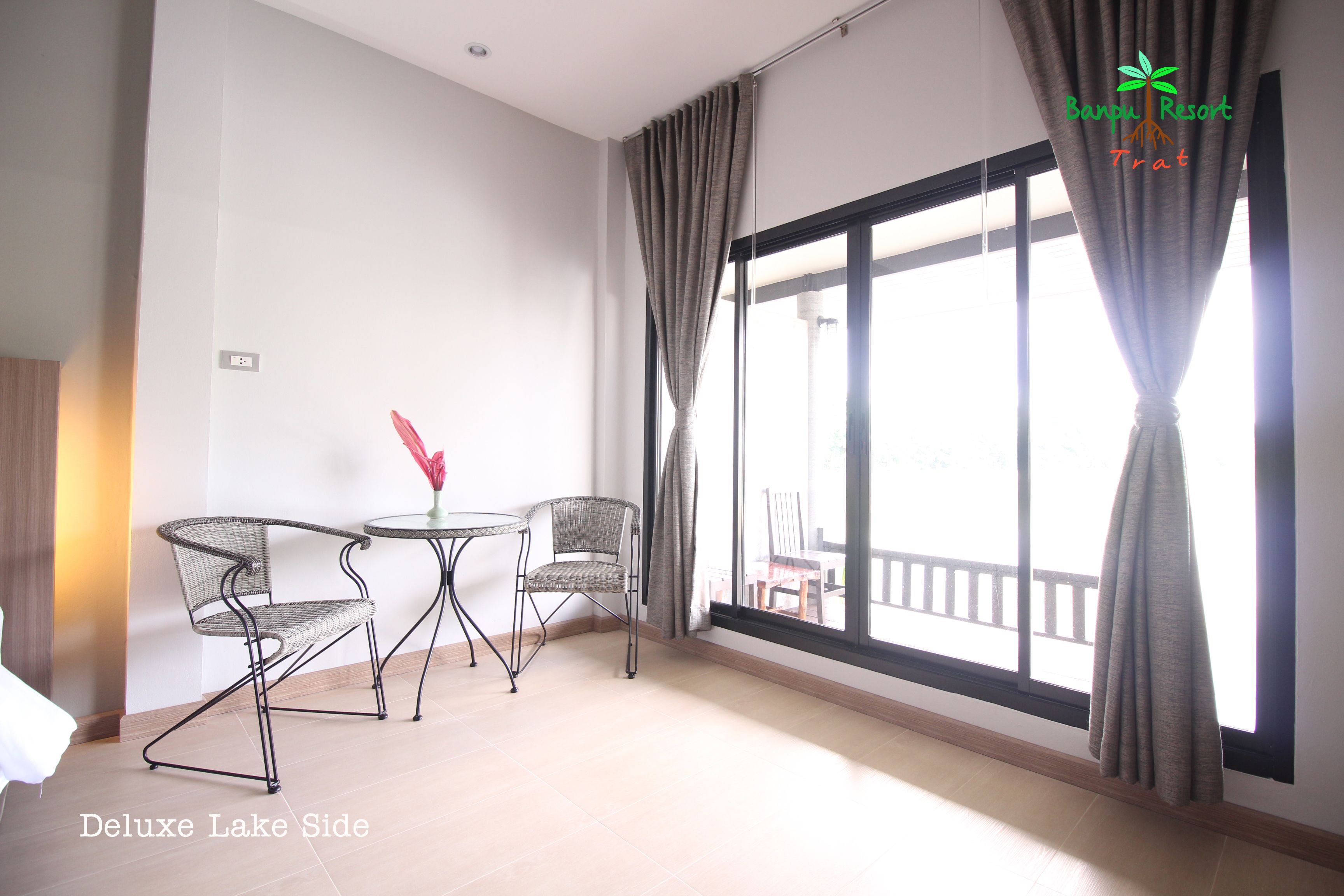 deluxe lake side view  | living area | lcd tv