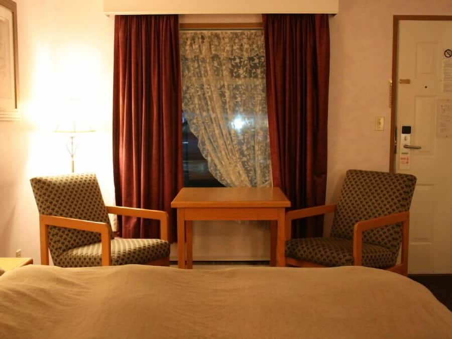 Desk, blackout drapes, iron/ironing board, free WiFi