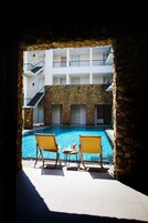 Outdoor pool, pool umbrellas, sun loungers