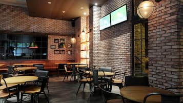 2 bars/lounges, rooftop bar, sports bar