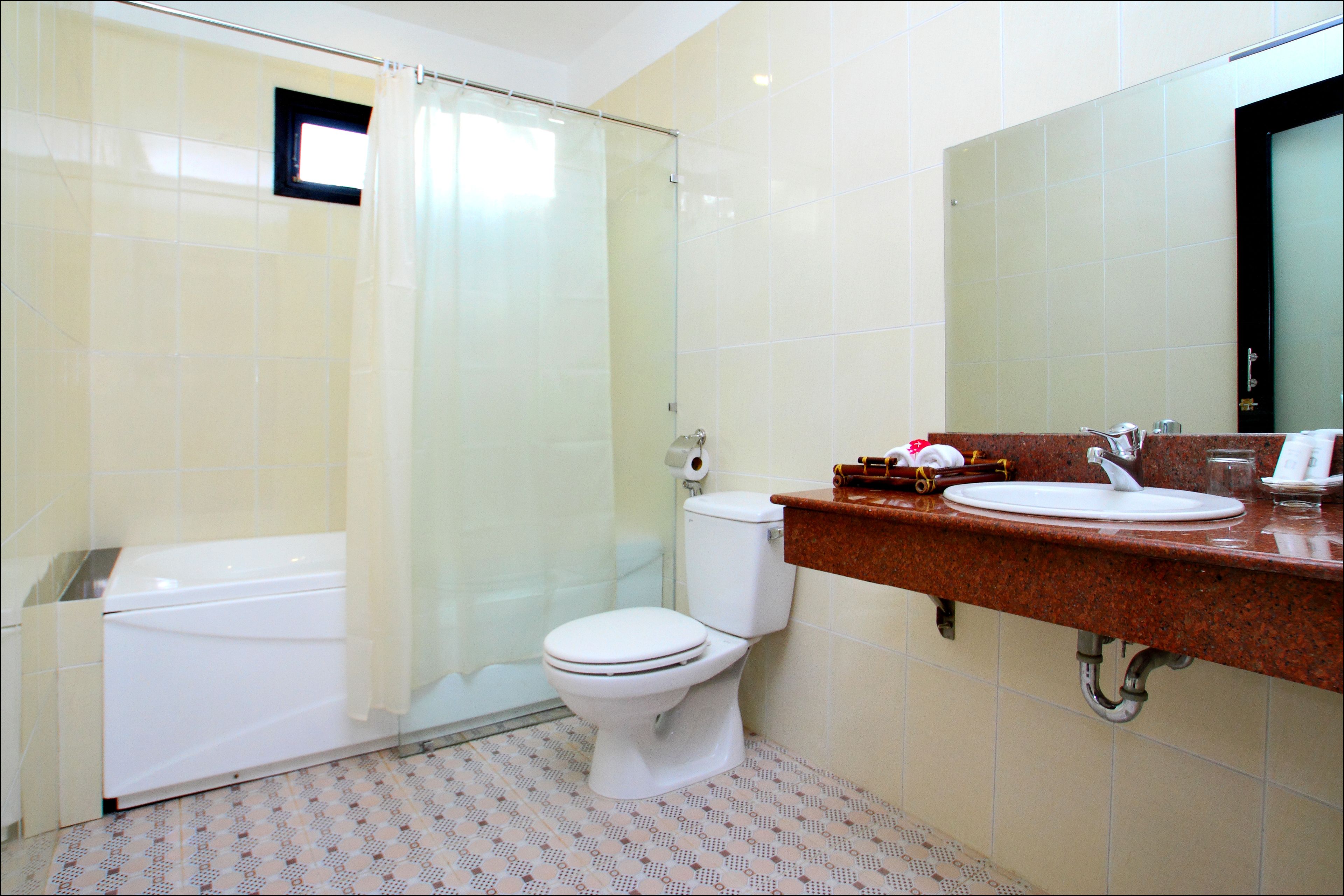 deep-soaking bathtub, rainfall showerhead, free toiletries, hair dryer