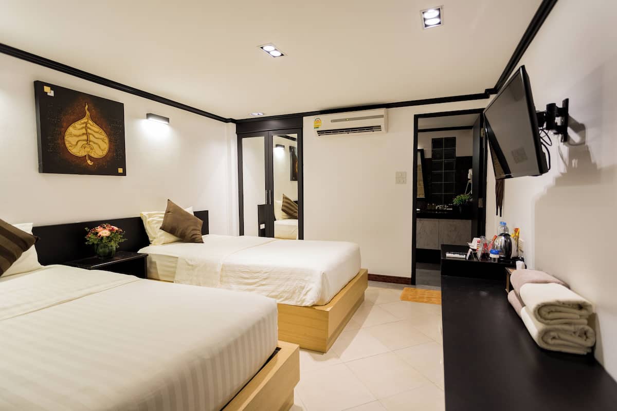 ห้องแฟมิลี่สำหรับสี่ท่าน, หลายเตียง, ติดสวน | มินิบาร์, ห้องพักตกแต่งอย่างมีเอกลักษณ์, ห้องเก็บเสียง, Wi-Fi ฟรี