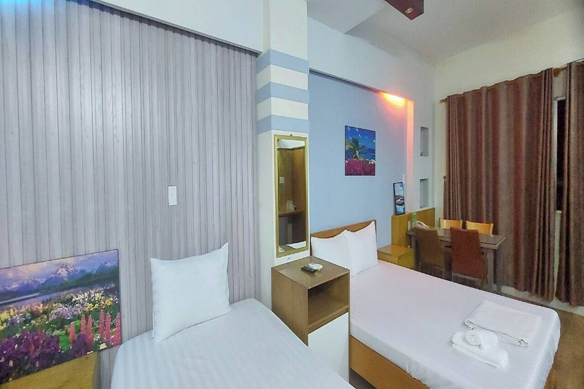 Family Room | Minibar, in-room safe, desk, free WiFi