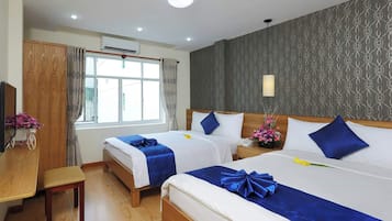 Quadruple Room | Minibar, in-room safe, desk, free WiFi