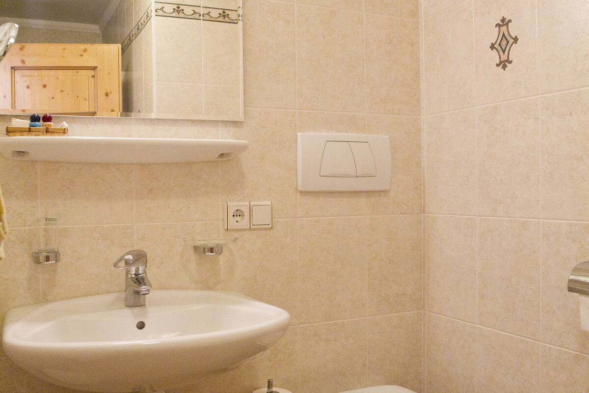 shower, hair dryer, bathrobes, bidet