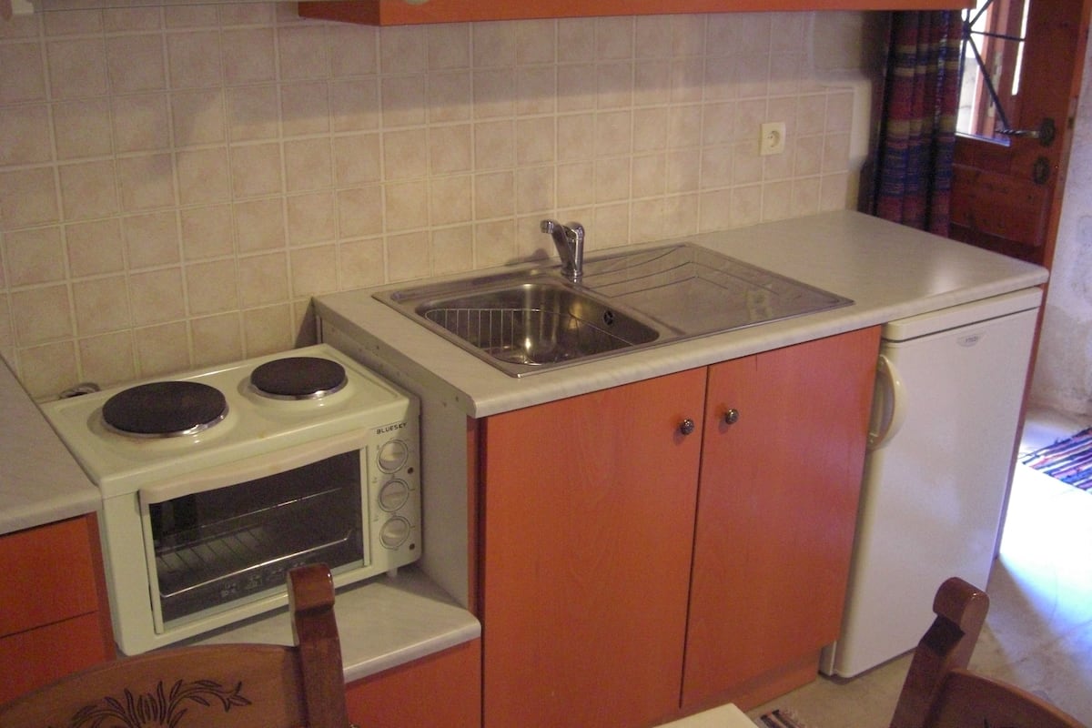 apartment, 1 bedroom, balcony (chryssi) | private kitchenette | fridge, stovetop, coffee/tea maker, electric kettle