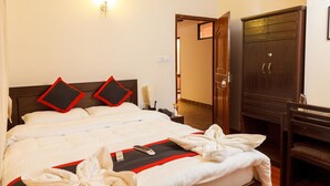 Chambre simple Deluxe | Coffre-fort, bureau, système d’insonorisation, fer et planche à repasser