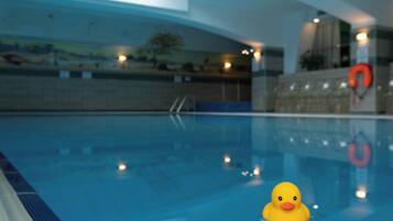 Indoor pool, open 8:00 AM to 8:00 PM, pool loungers