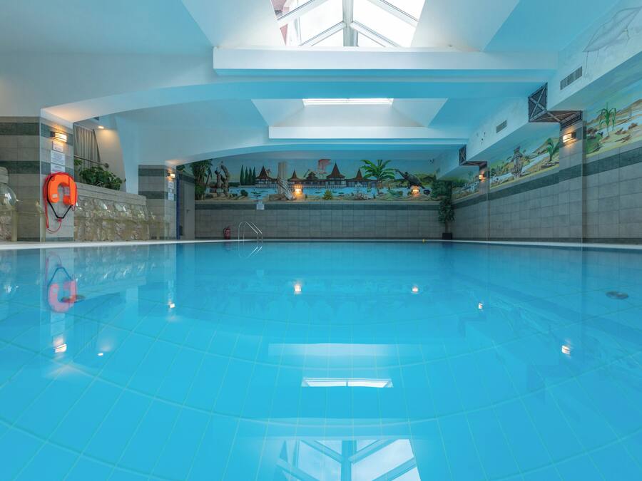Indoor pool, open 8:00 AM to 8:00 PM, sun loungers