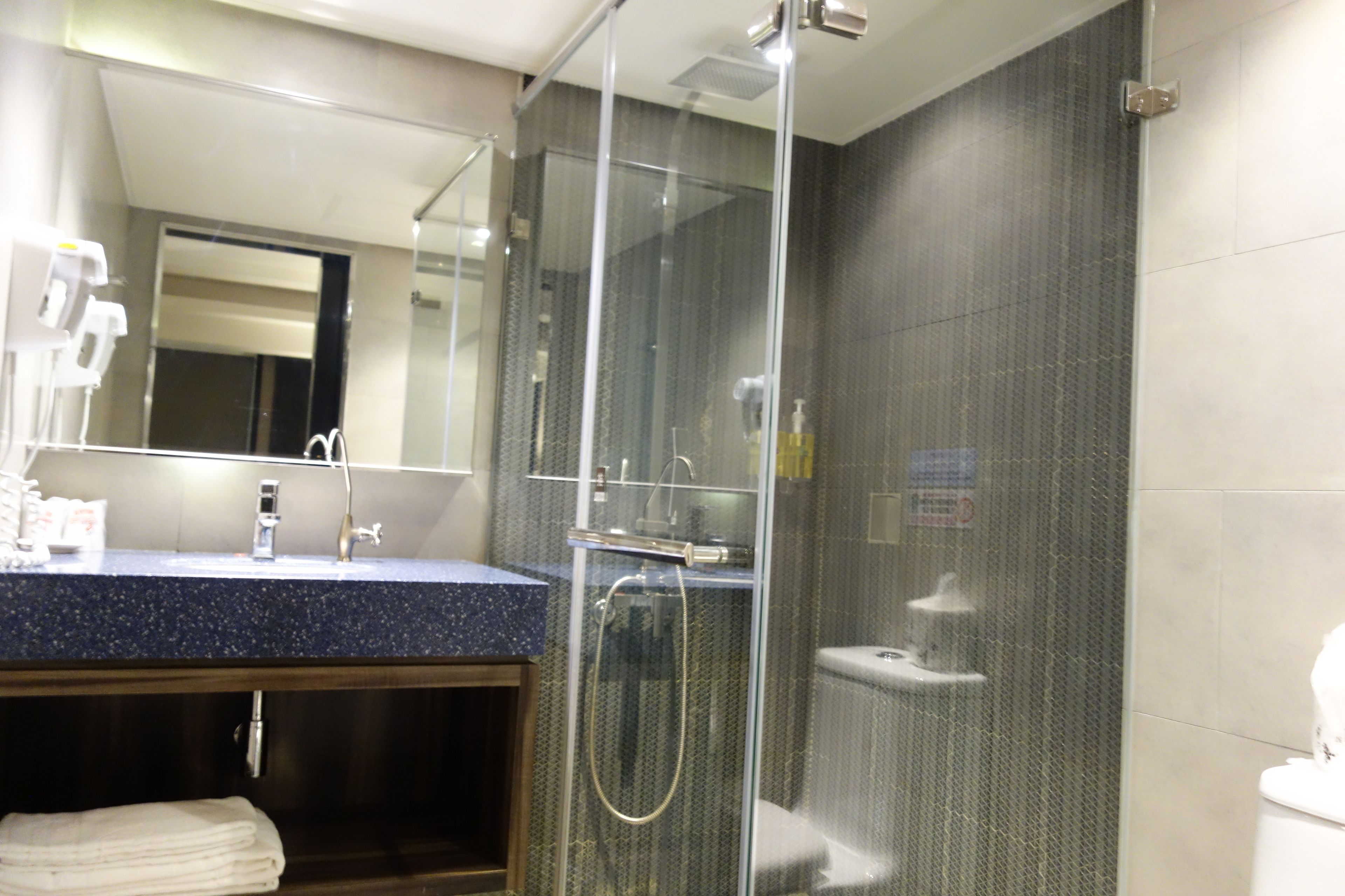 standard twin room (non-smoking) | bathroom amenities | shower, hair dryer, slippers, towels
