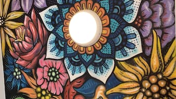 A vibrant floral mural on a wall.