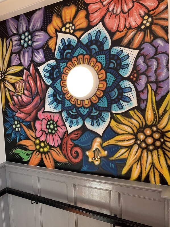 A vibrant floral mural on a wall. - Galway City Hostel & Bar (Galway)