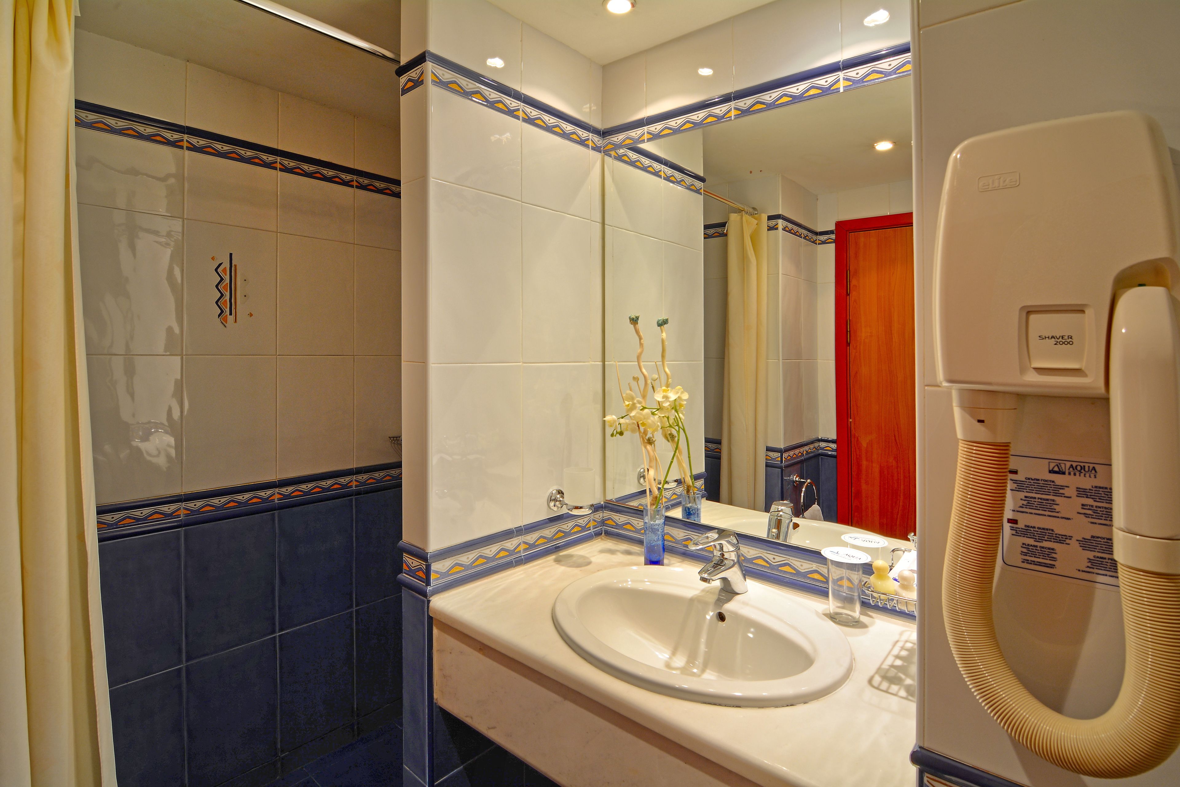 premium double or twin room | bathroom | designer toiletries, hair dryer, towels