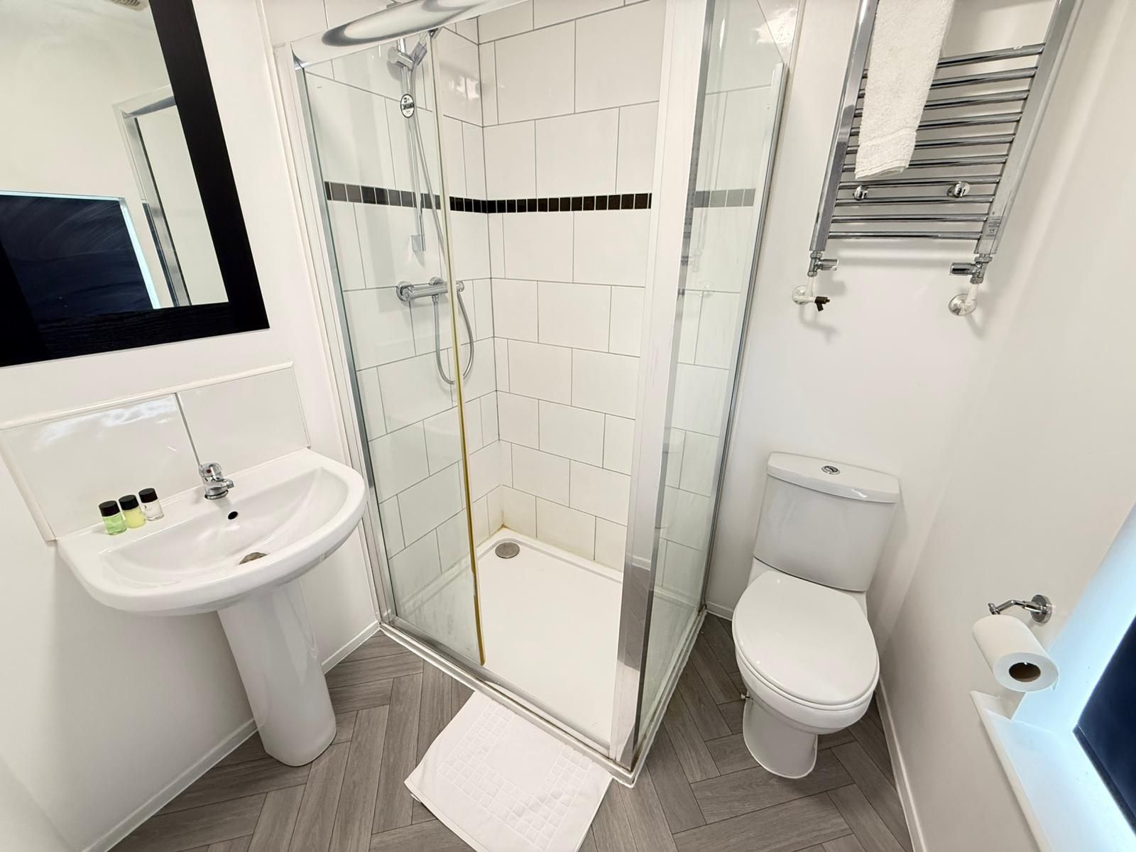 Shower, free toiletries, hair dryer, towels