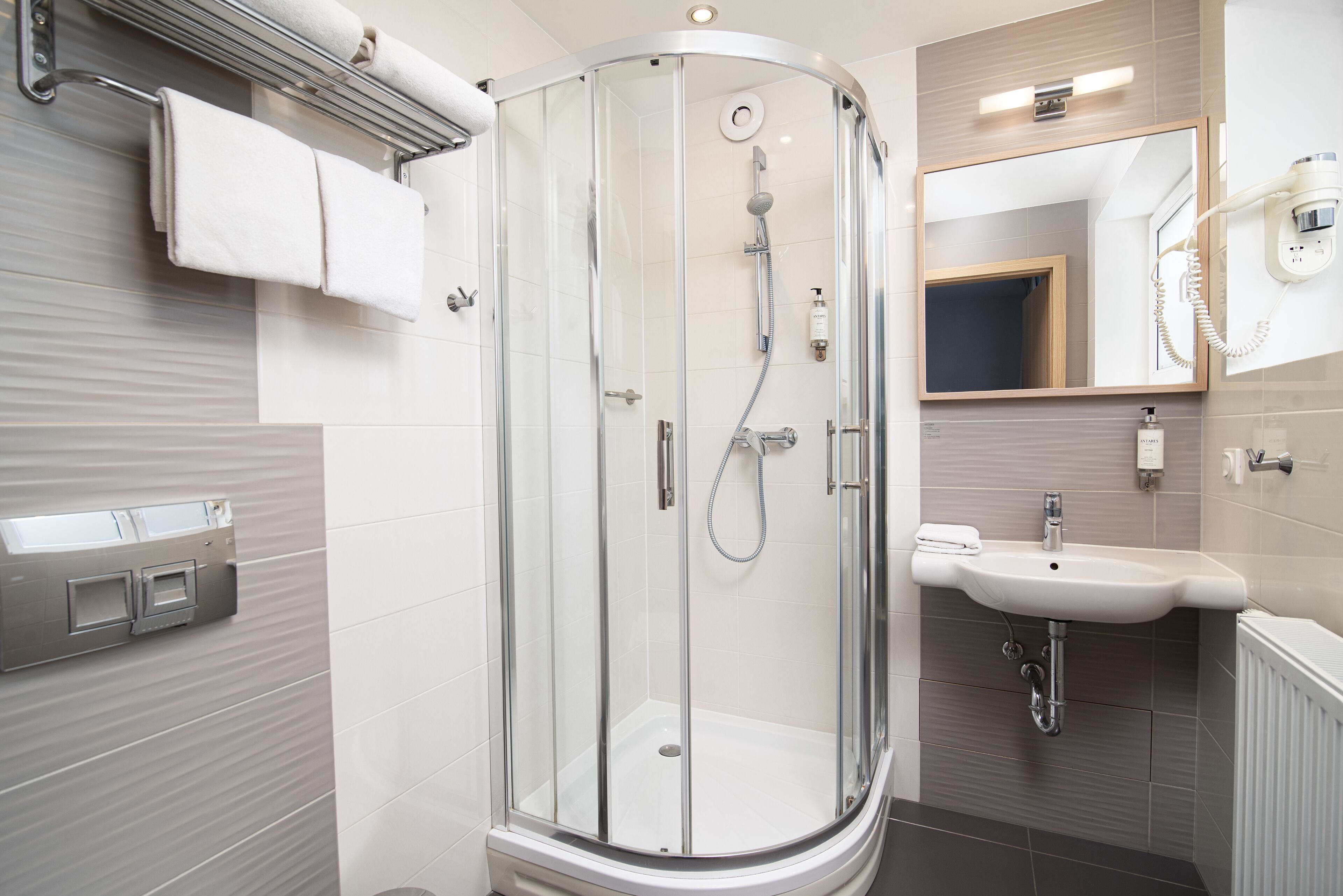 shower, free toiletries, hair dryer, towels