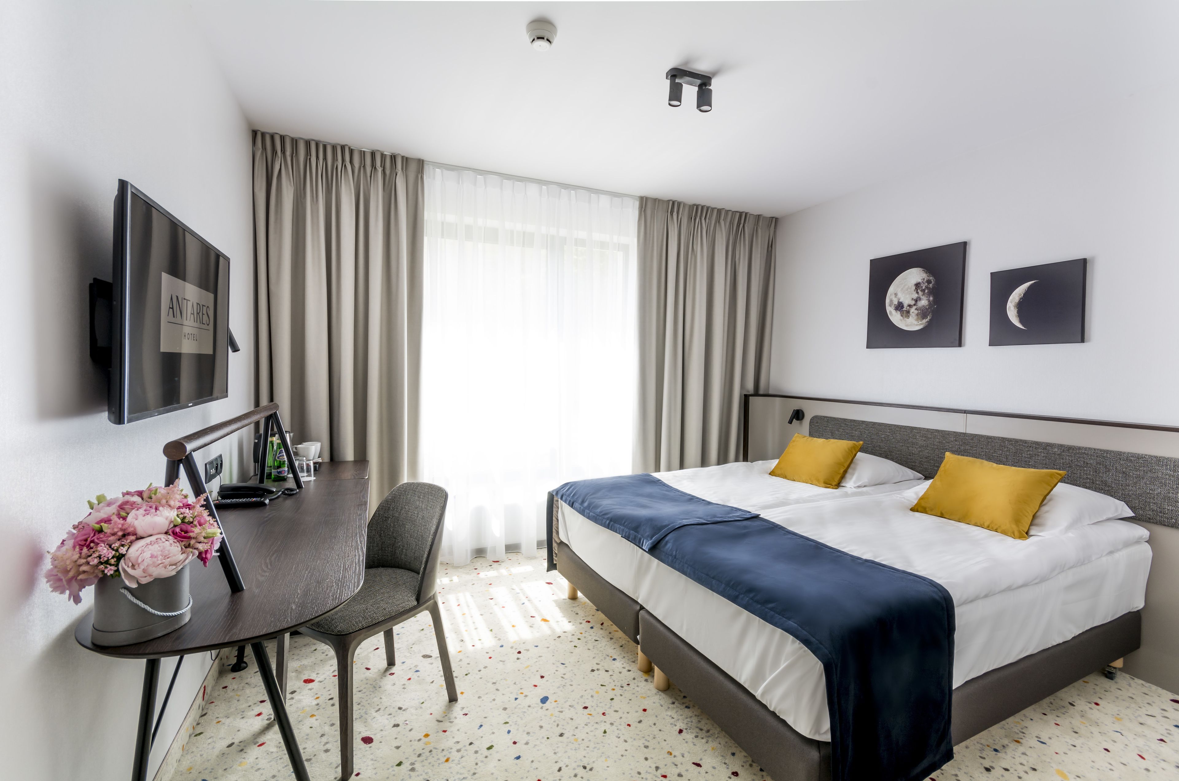 deluxe single room | in-room safe, desk, laptop workspace, blackout curtains